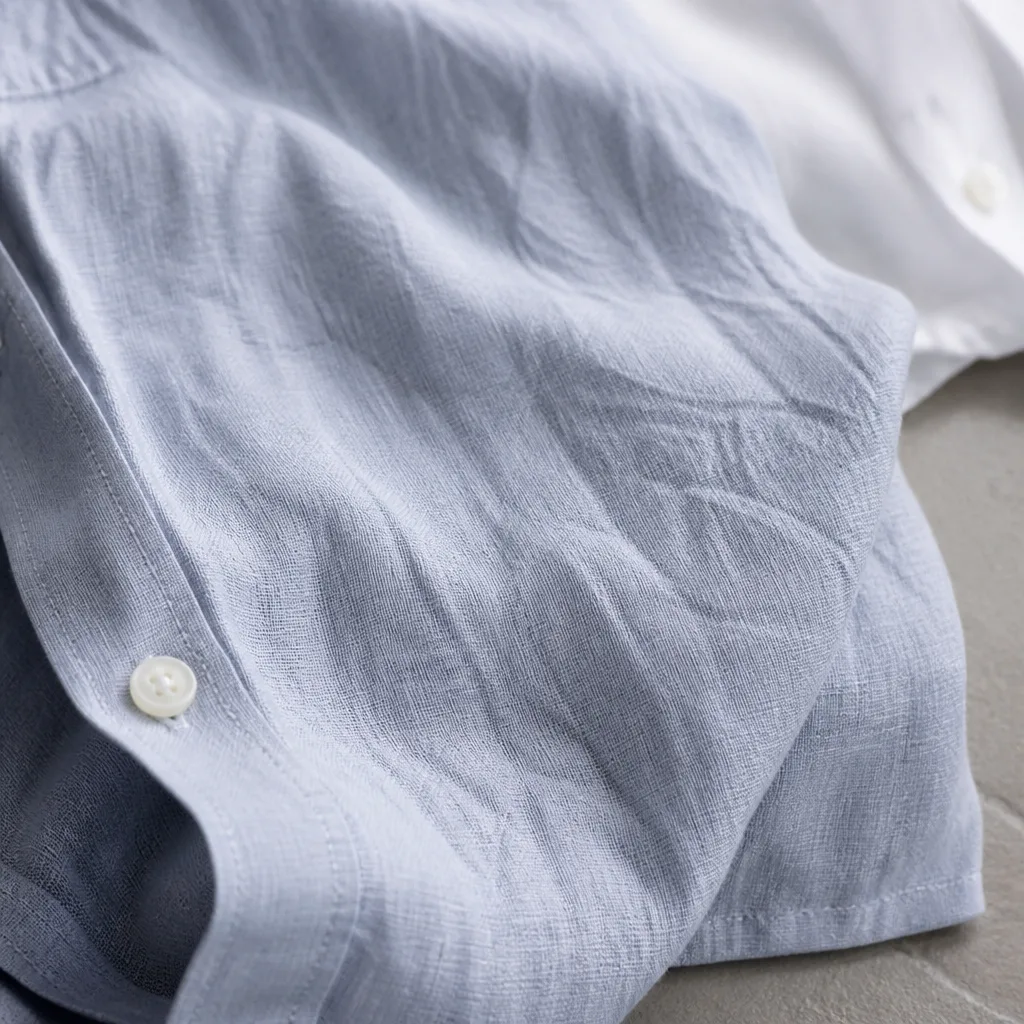 close-up texture of natural linen fabric with fine wrinkles